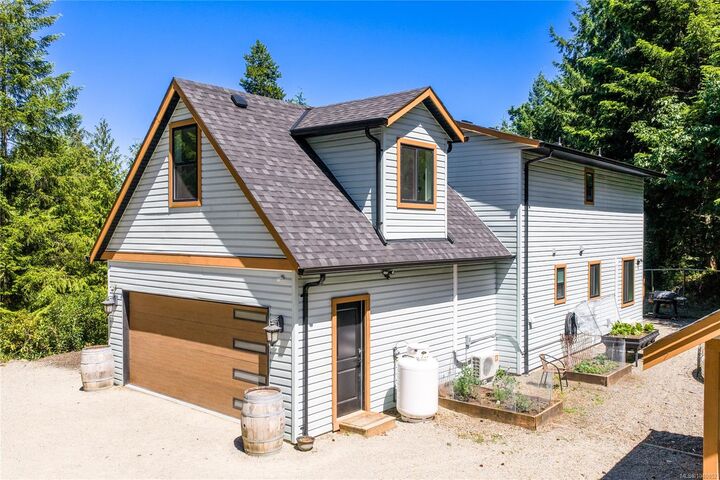 Property Photo: 1691 Meadowood Way BC V9K 2S3