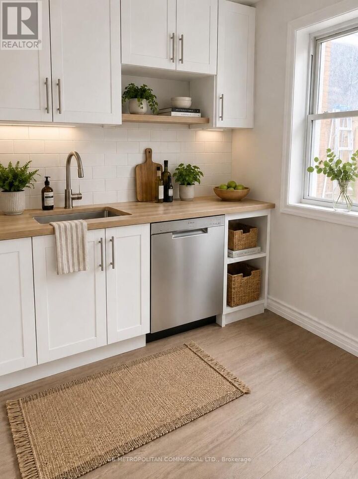 Property Photo: 1255 Dundas Street West Upper ON M6J 1X6