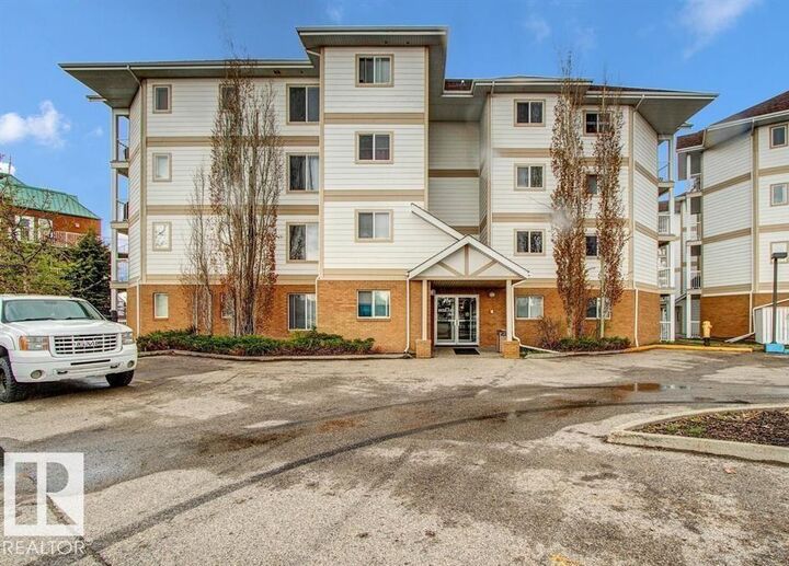Property Photo: 9932 100 Avenue 109 AB T8L 4L2