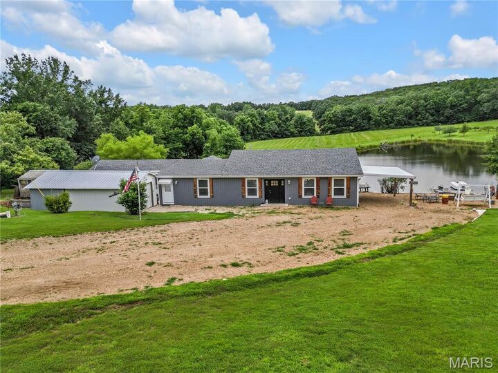 Property Photo:  1824 Morre Road  MO 65066 