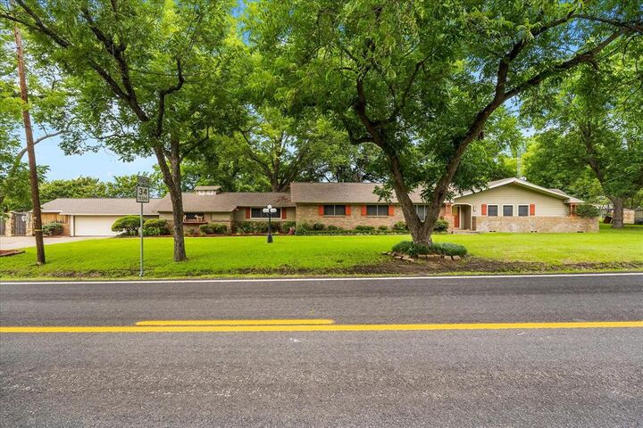 Property Photo:  110 W Crockett Street  TX 75496 