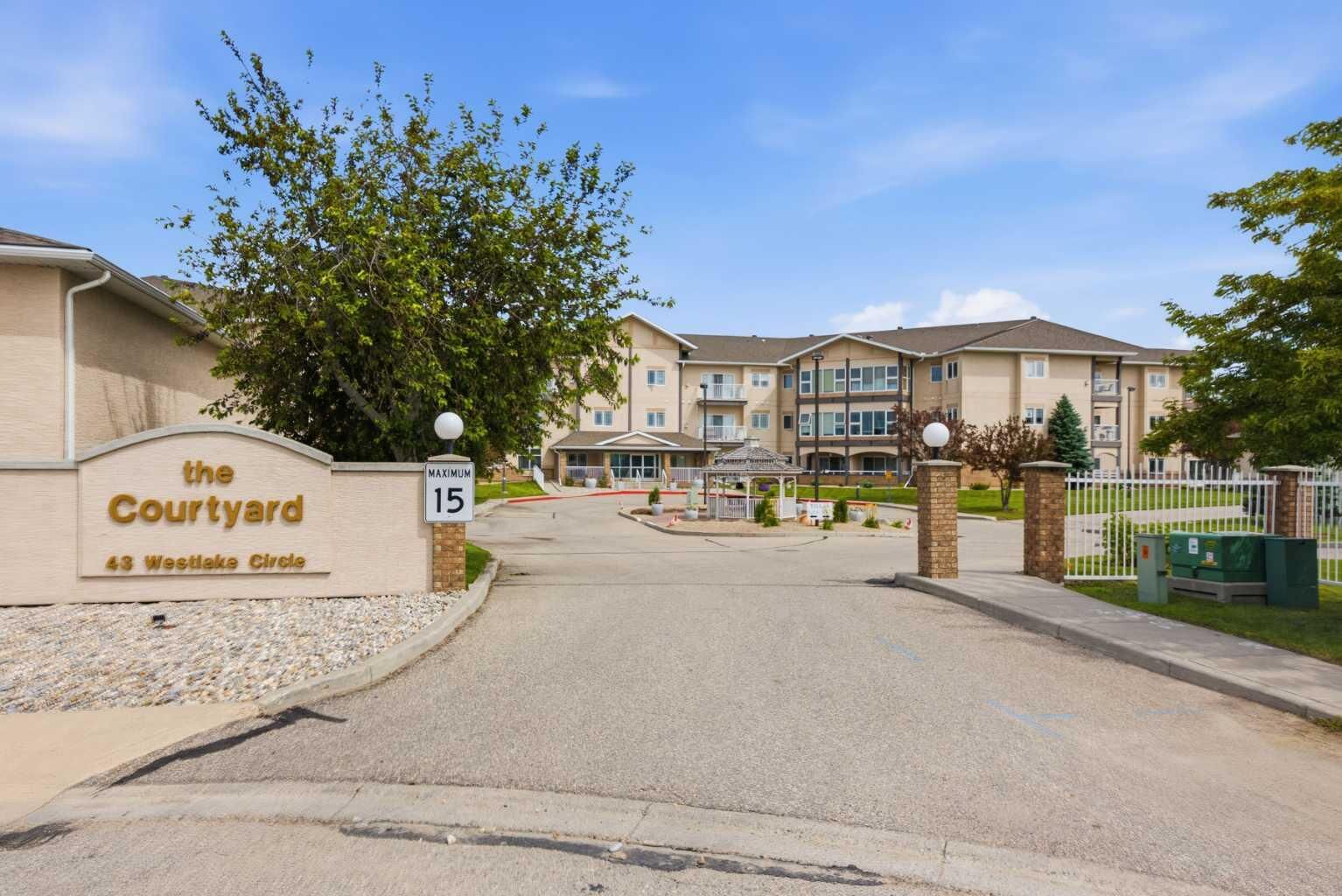 Property Photo:  43 Westlake Circle 203  AB T1P 1T9 