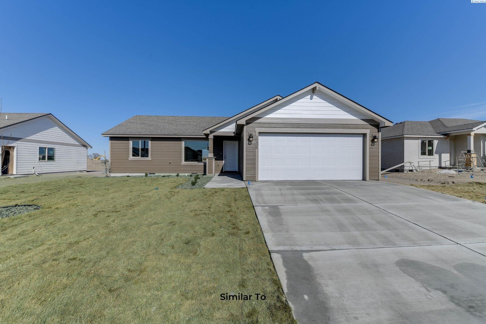 Property Photo:  10115 Redbud Dr  WA 99301 