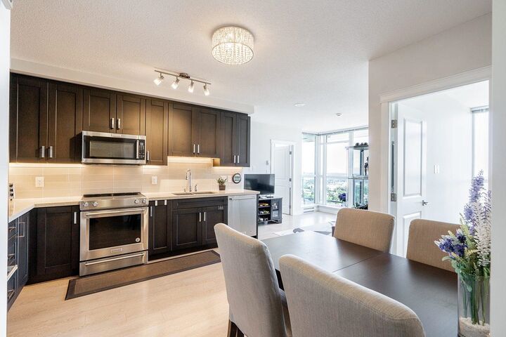 Property Photo: 11967 80 Avenue 3206 BC V4C 0E2