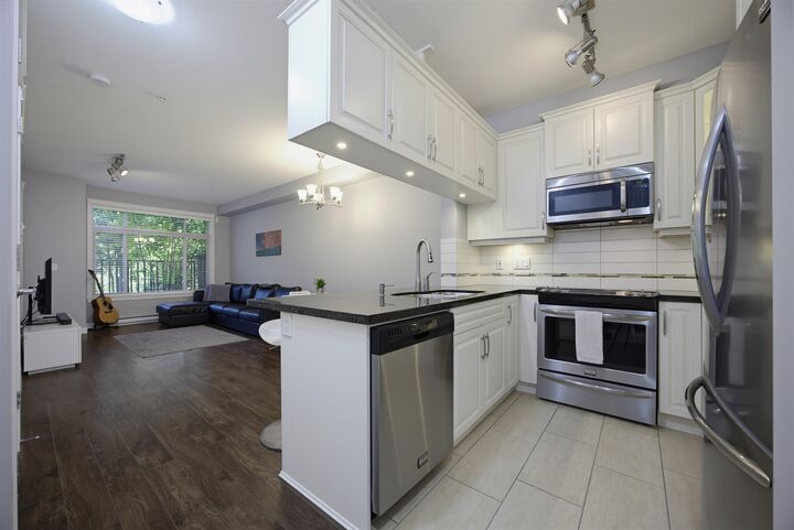 Property Photo: 12565 190A Street 111 BC V3Y 0E1