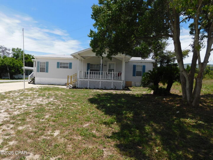 Property Photo:  606 Malaga Place  FL 32413 