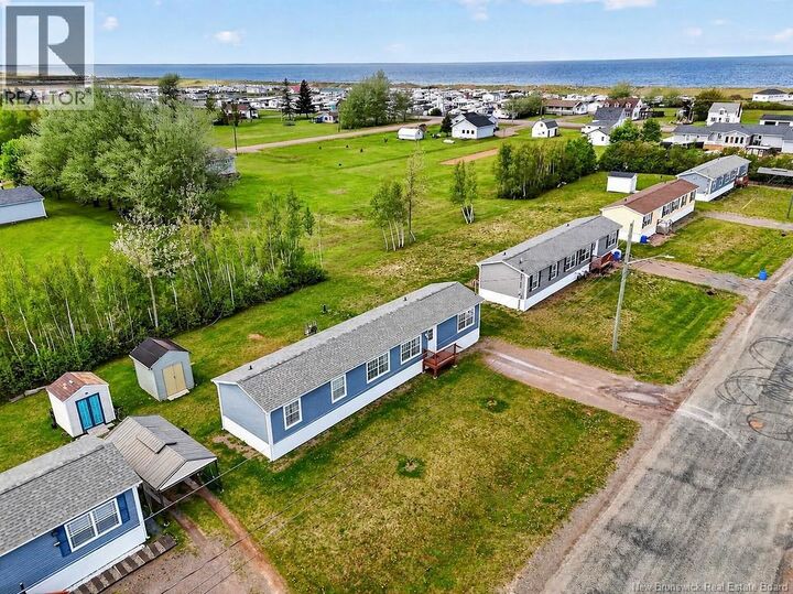 Property Photo:  19 Rue Anna  NB E4N 0E3 