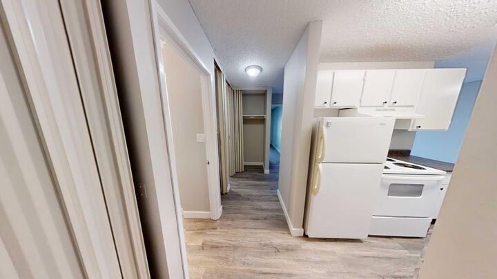 Property Photo:  10028 105 Avenue 23  AB T8V 1H1 