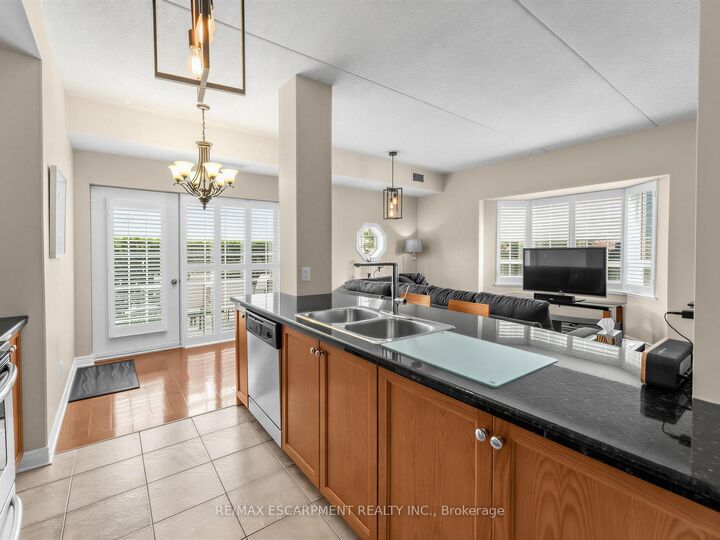 Property Photo: 1379 Costigan Road 103 ON L9T 2K6