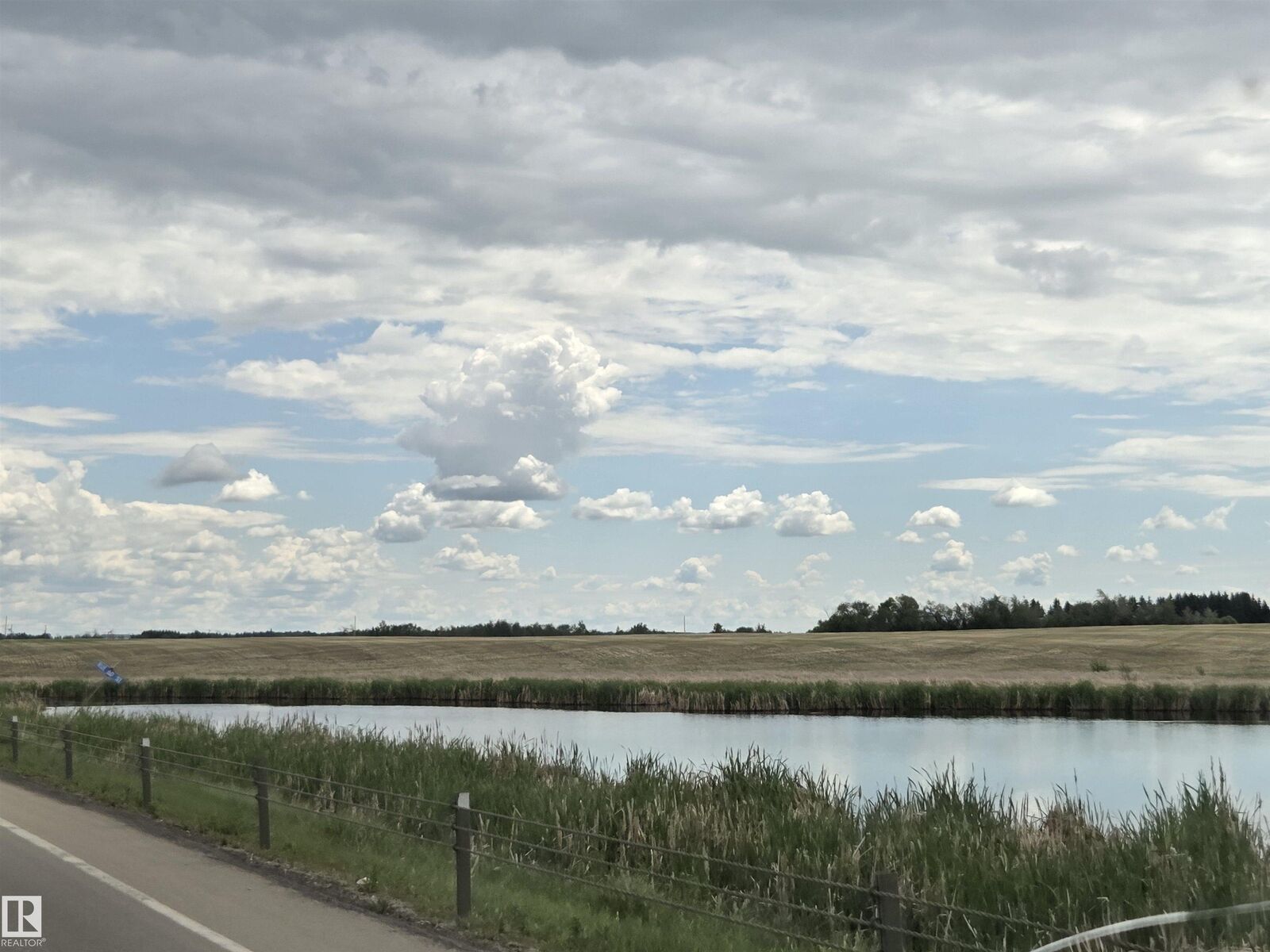 Property Photo:  24209 Hwy 625  AB T4X 1E4 