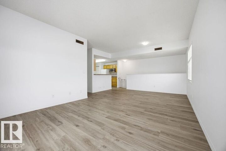 Property Photo: 1179 Summerside Drive SW 34 AB T6X 1K1