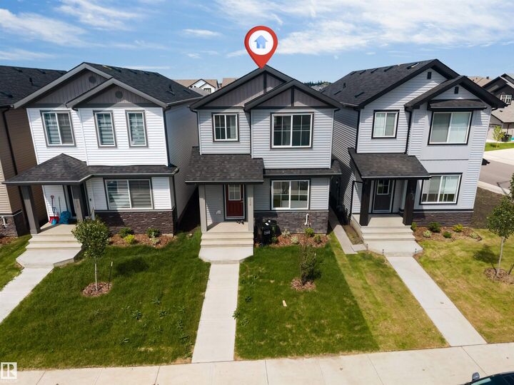 Property Photo:  1208 14 Ave NW  AB T6T 2W2 