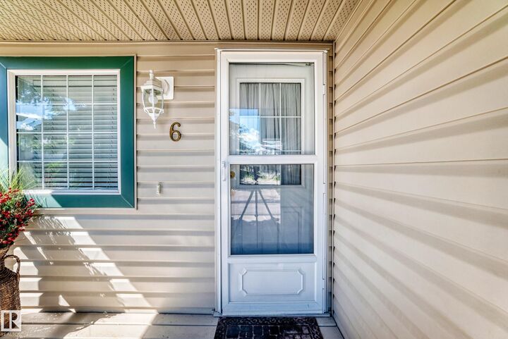Property Photo:  14803 Miller Boulevard NW 6  AB T5Y 3A4 