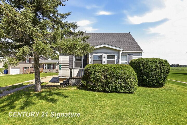 Property Photo:  6737 Dixie Highway  MI 48722 