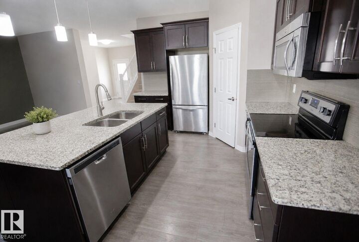 Property Photo: 8 Meadowlink Common AB T7X 0W1