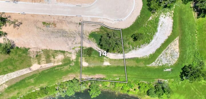 Property Photo:  141 Tranquil Mirror Lake Court Lot 14  FL 34711 