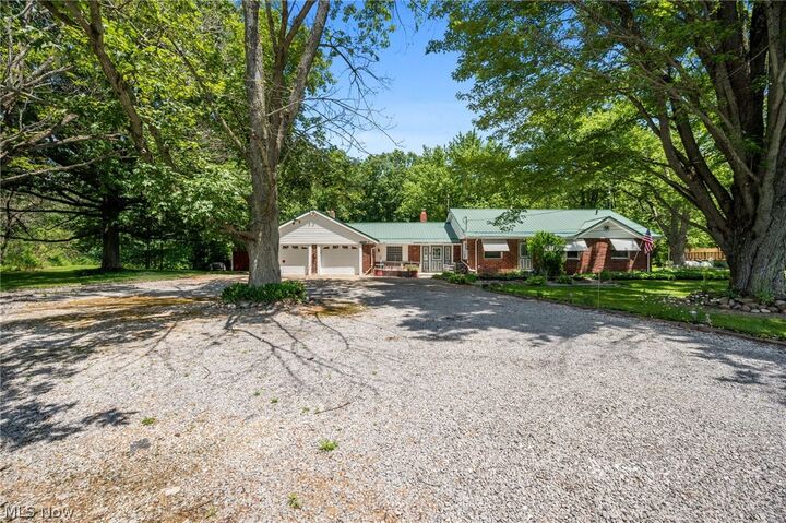 Property Photo:  5950 Parkman Road NW  OH 44481 