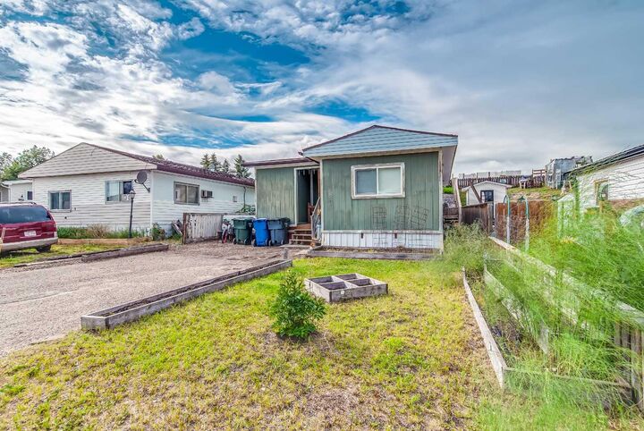 Property Photo:  223 Fairchild Street SW  AB T1A 7Z6 