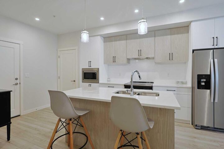 Property Photo: 138 Sage Valley Common NW 403 AB T3R 1X7