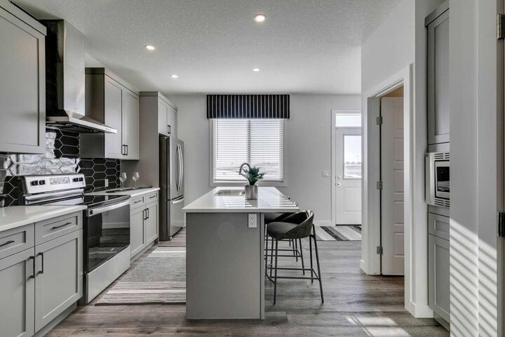 Property Photo: 148 Snowberry Common SE AB T3M 4G7