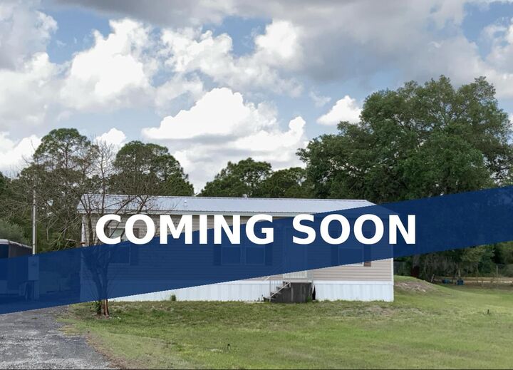 Property Photo:  220 N Sendero Street  FL 33440 