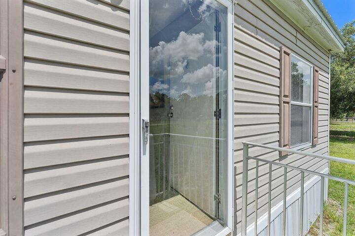 Property Photo:  220 N Sendero Street  FL 33440 