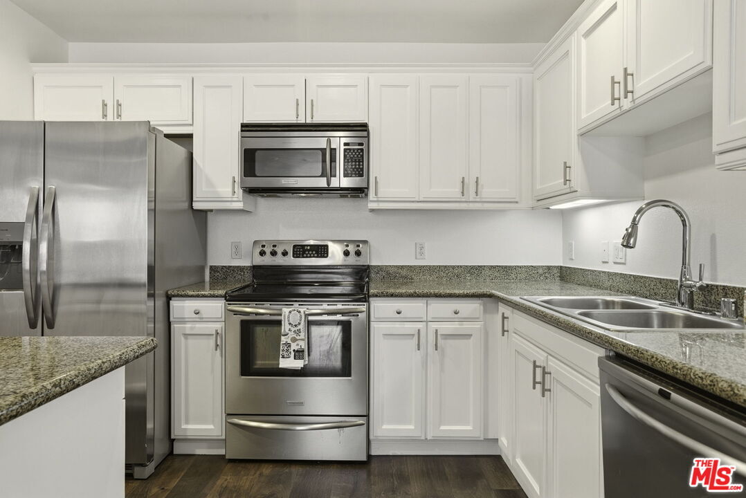 Property Photo:  3740 Santa Rosalia Dr  CA 90008 