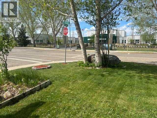 Property Photo: 144 Upland Boulevard West AB T1R 0R3