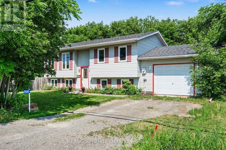 7496 Roger Stevens Drive — photo 1
