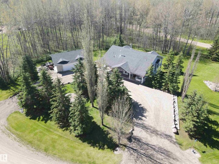 Property Photo: 74 465022 Range Road 61 AB T0C 0T0