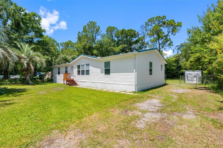 Property Photo:  6847 Woodsman Drive  FL 33544 