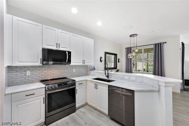 Property Photo: 1430 Mariposa Circle 102 FL 34105