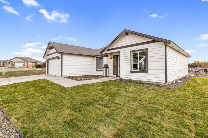 Property Photo:  6557 W 29th Ct  WA 99338 