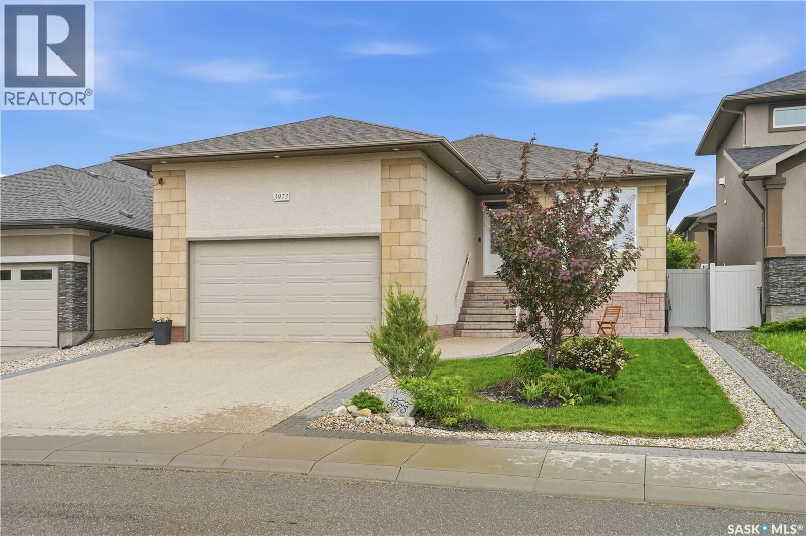 Property Photo: 3973 Sandhill Crescent SK S4V 3G7