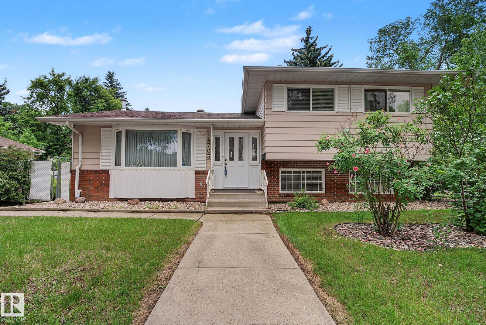 Property Photo: 14703 65 Street NW AB T5A 2C9