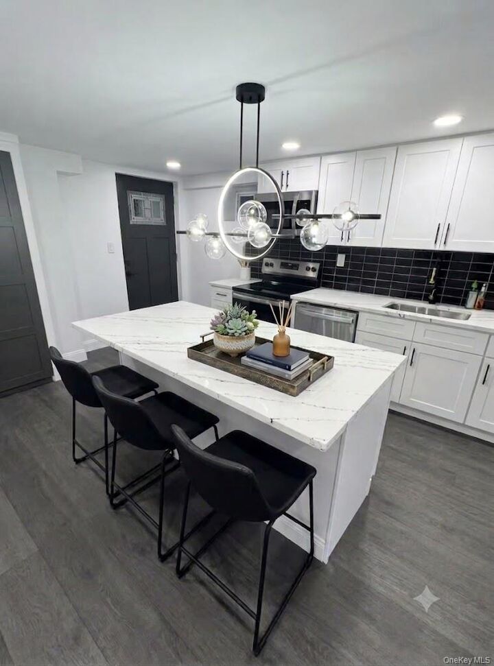 Property Photo:  301 Merrick Avenue  NY 11554 