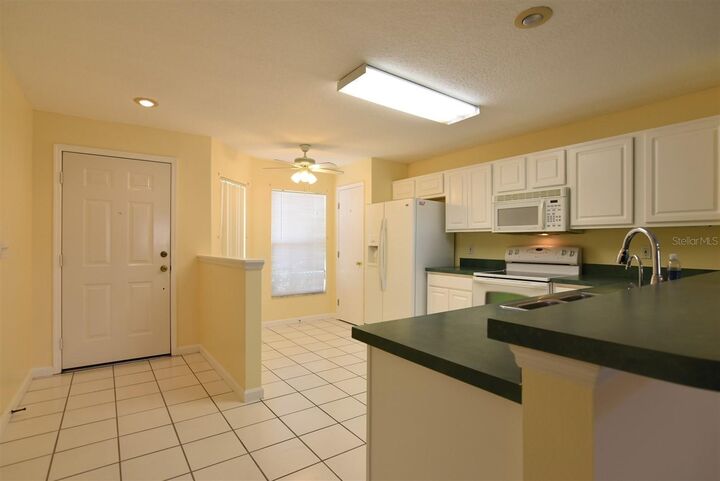 Property Photo:  2203 Cypress Knee Loop  FL 34743 