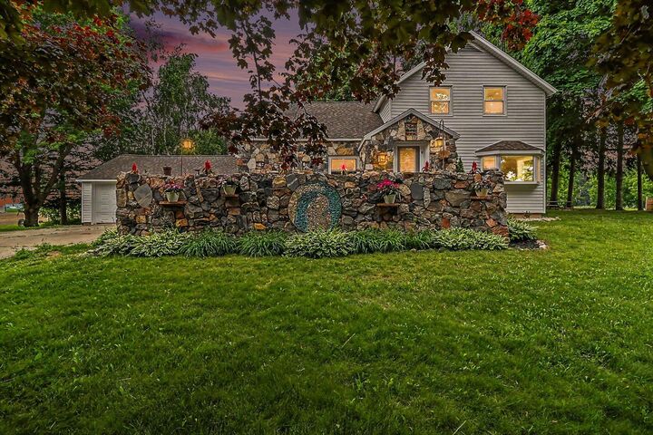 Property Photo:  6301 S Stiles Road  MI 49449 