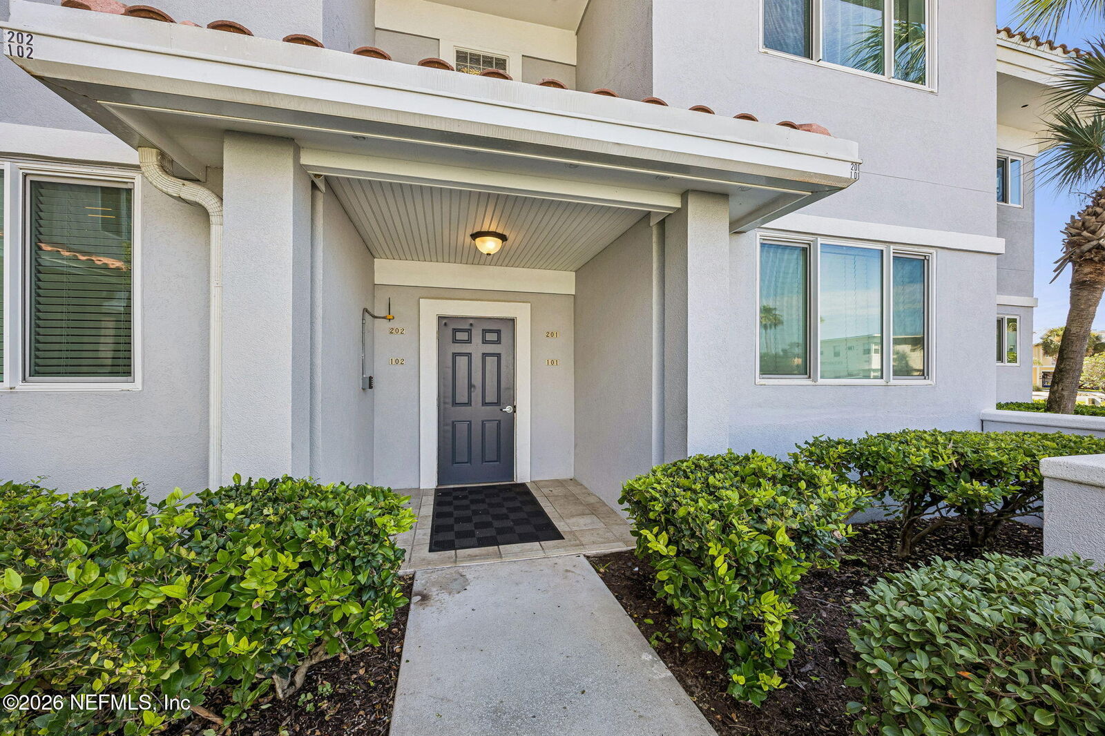 Property Photo:  201 10th Avenue N 102N  FL 32250 