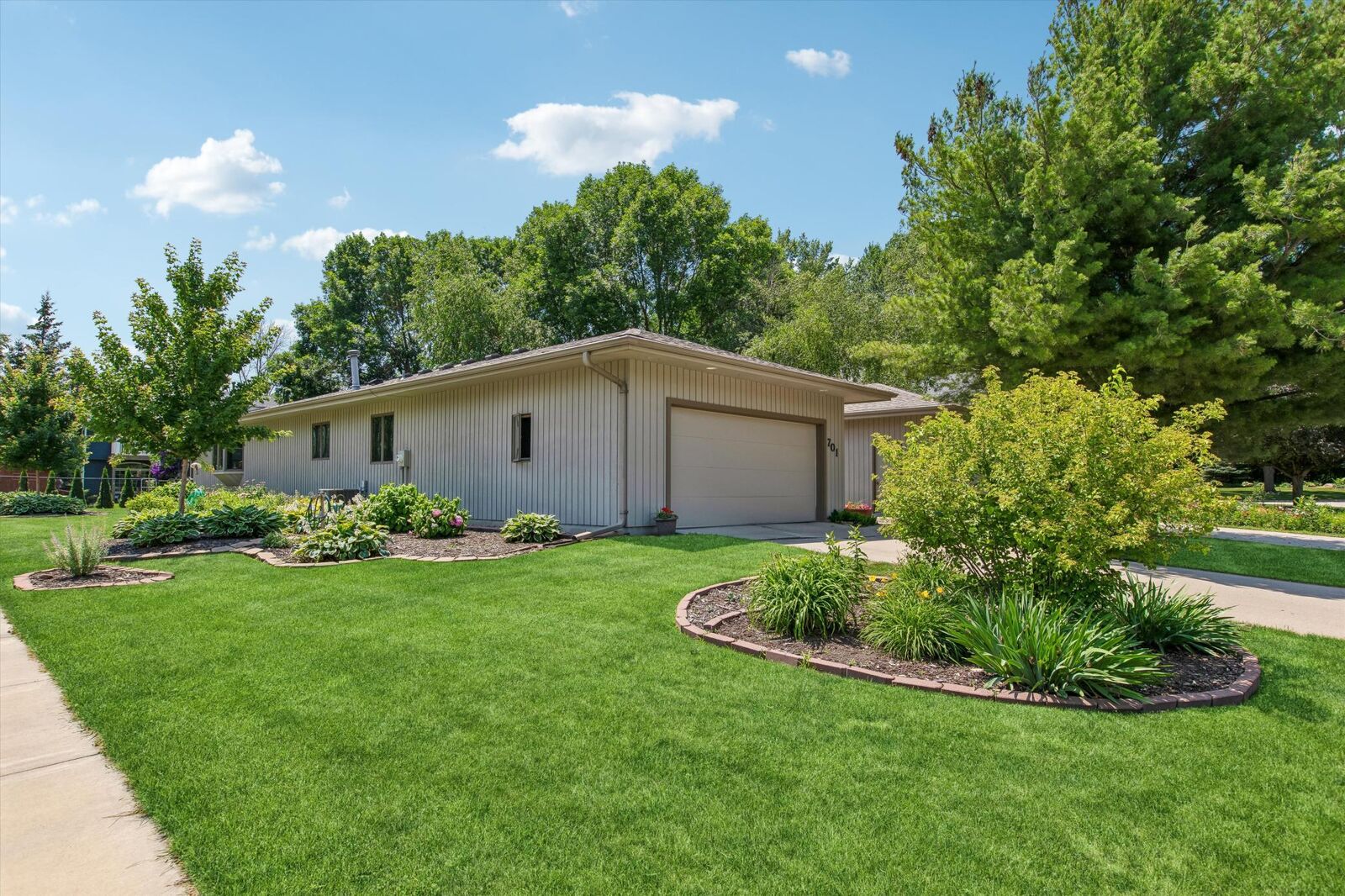Property Photo:  701 Hackerson Court  MN 55057 