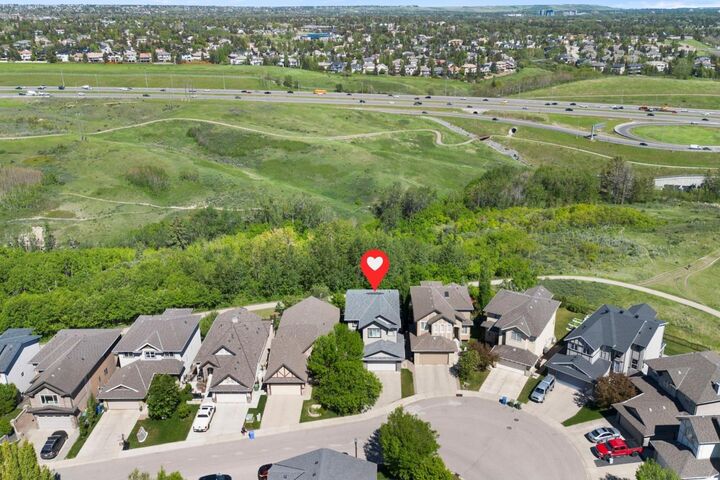 Property Photo:  382 Tuscany Ravine Road NW  AB T3L 3A9 