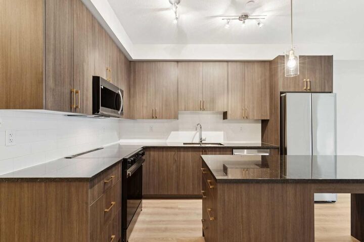 Property Photo: 740 Legacy Village Road SE 2206 AB T2X 5X3