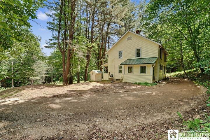 Property Photo: 8765 Coon Hollow Road NY 14770