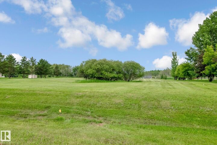 Property Photo:  #4 46511 Twp Rd 611  AB T9N 2J6 
