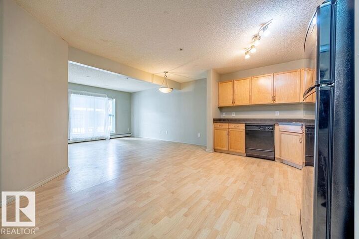 Property Photo: 646 McAllister Loop SW 122 AB T6W 0B5