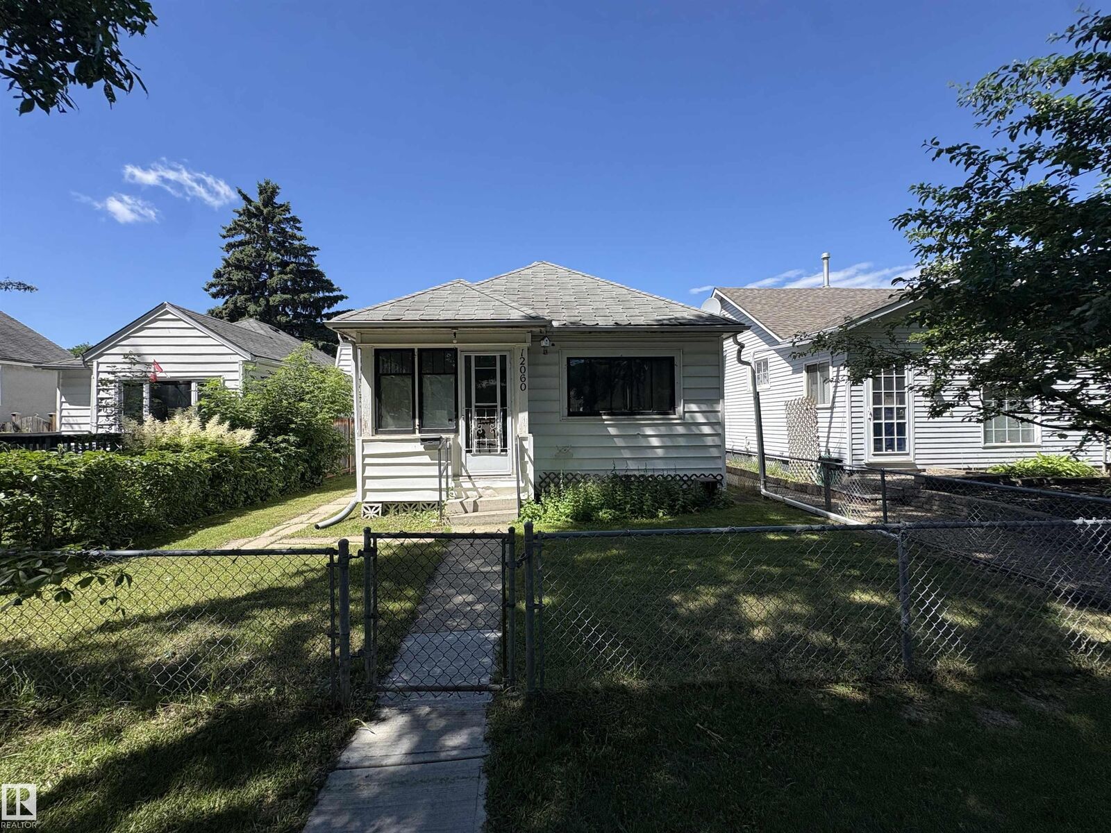 Property Photo: 12060 94 Street NW AB T5G 1J7