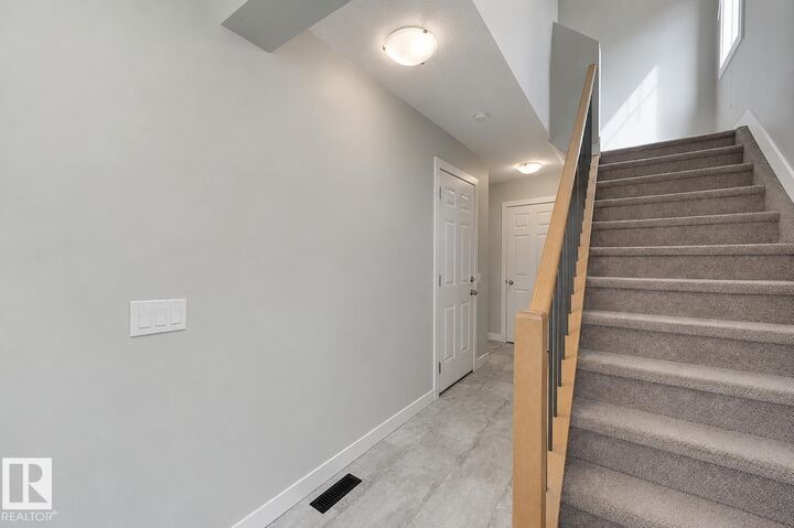 Property Photo: 150 Edwards Drive SW 99 AB T6X 1M4