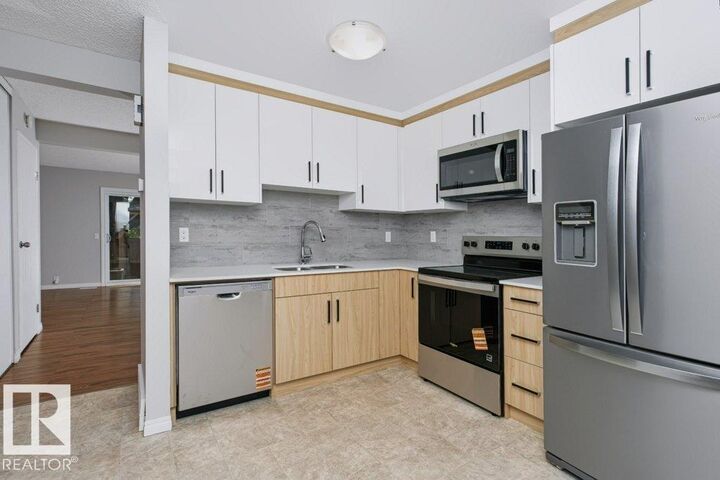 Property Photo: 14511 52 Street NW 24 AB T5A 4M6