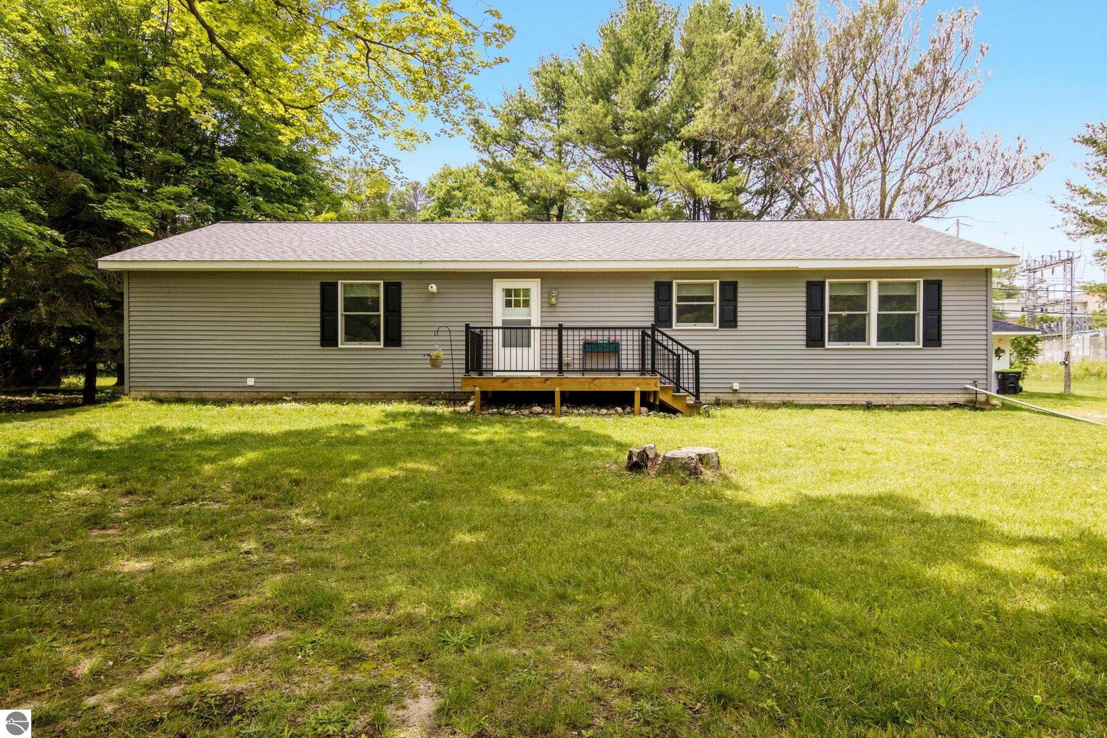 Property Photo: 310 S Shabwasung Street MI 49670