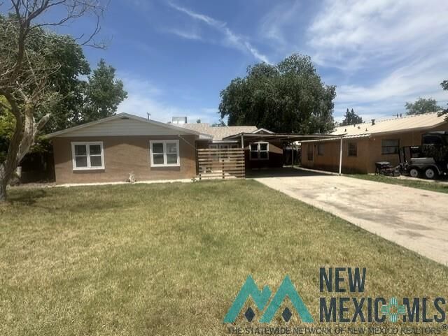 Property Photo:  306 W Chisum Avenue  NM 88220 